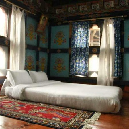 Chimi Lhakhang Village Homestay Пунакха Экстерьер фото